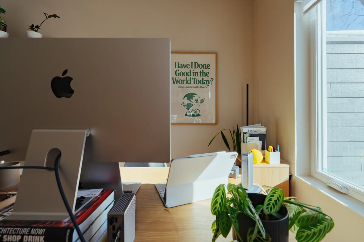 A finished Florida home office with a mini-split head, durable flooring, and task lighting at a built-in desk