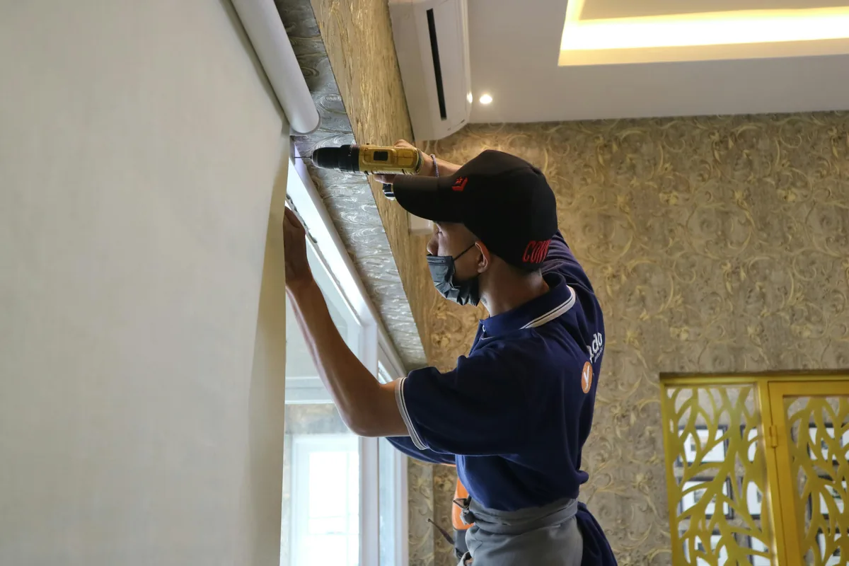 Edge profiling a stone countertop on a CNC machine before a Florida kitchen installation
