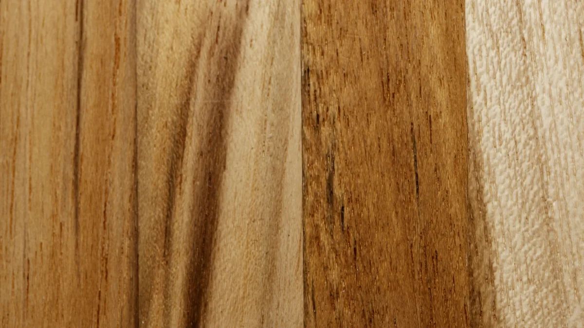Cross-section of sheet vinyl flooring showing the clear wear layer, printed design, and stabilizing backing