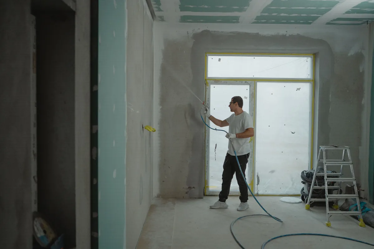 Mold-resistant fiberglass-mat drywall panel staged against framing in a Florida home